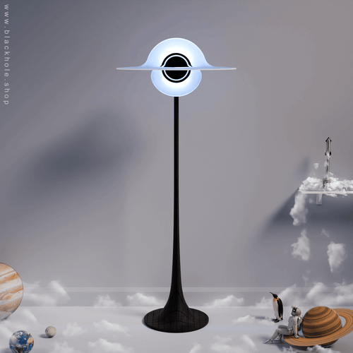 A Black Hole shaped floor lamp with a wooden sculptural stand, emitting soft light blue light. Wood stand features a stretched spacetime fabric pattern. 