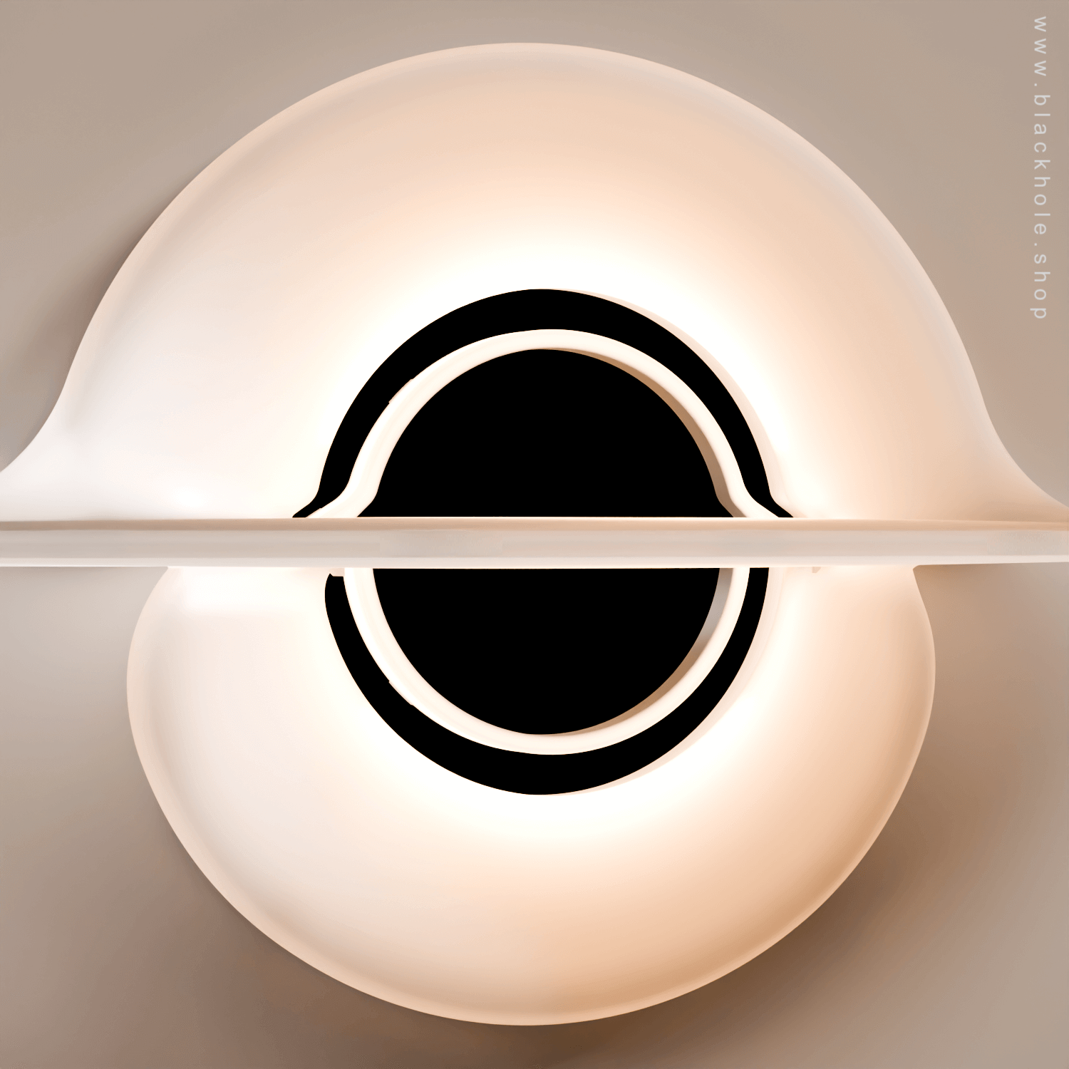 A Black Hole shaped wall lamp mounted on a wall & emitting warm white light.