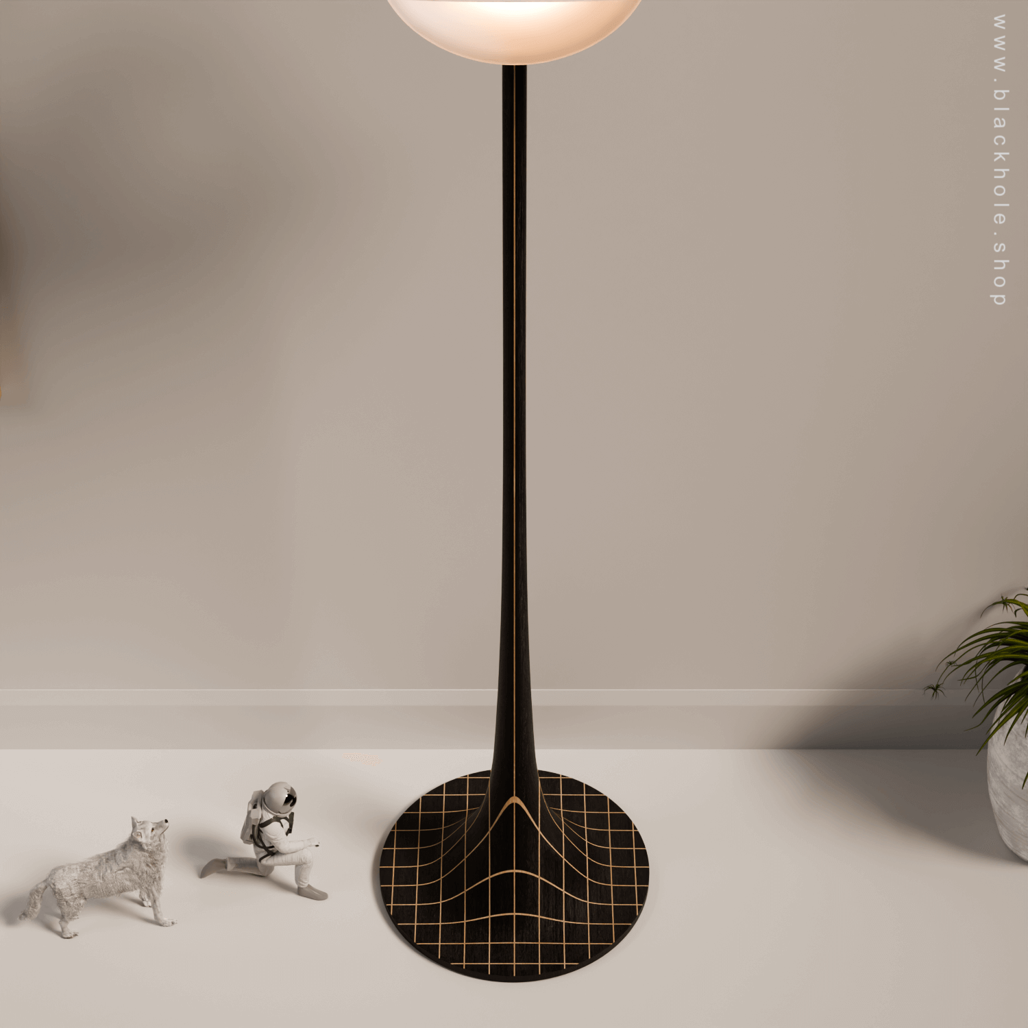 A Black Hole shaped floor lamp with a wooden sculptural stand, emitting warm white light. Wood stand features a stretched spacetime fabric pattern. 